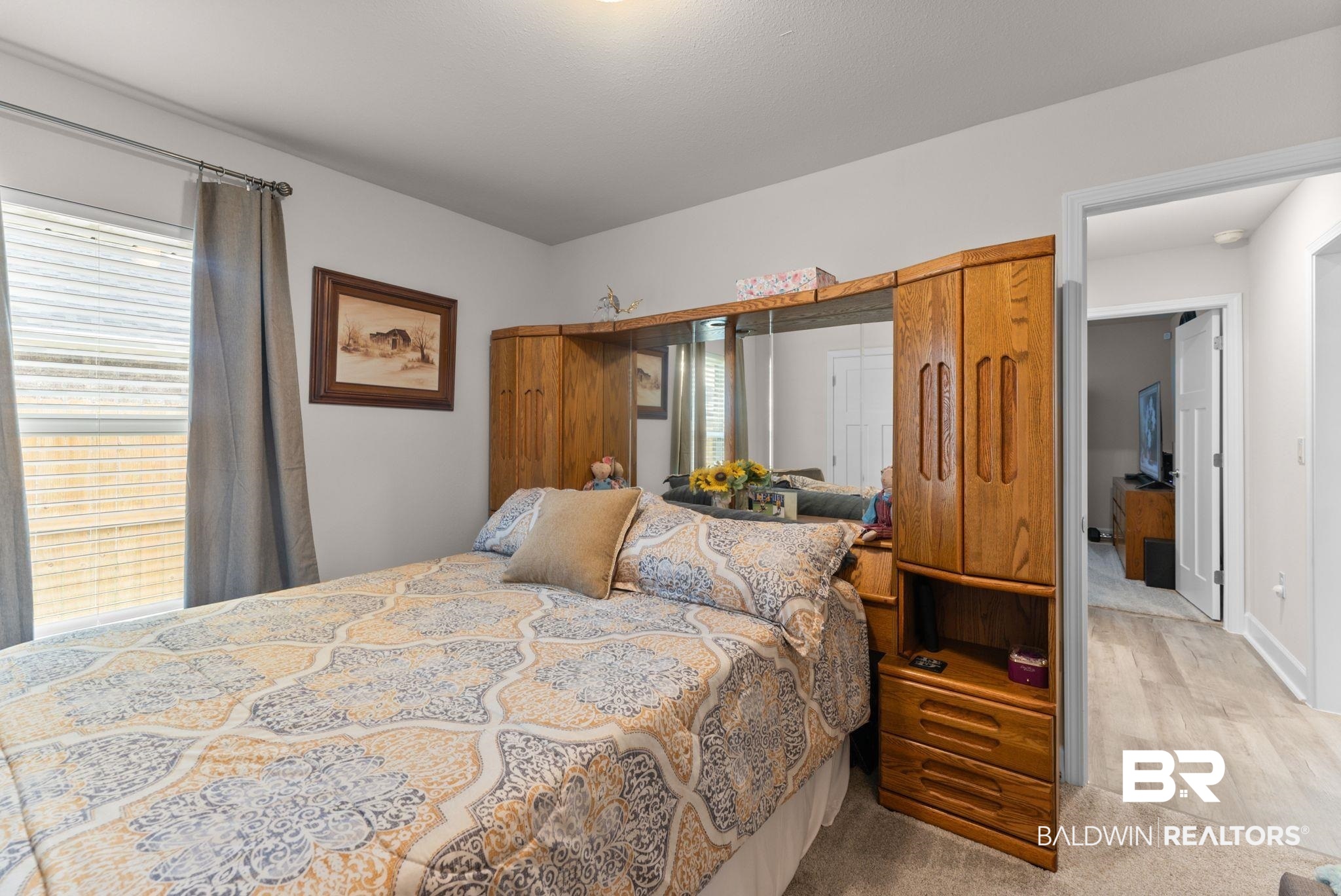 692 Mayflower Drive Foley, AL 36535 - Photo 22 of 40 Bedroom featuring light carpet