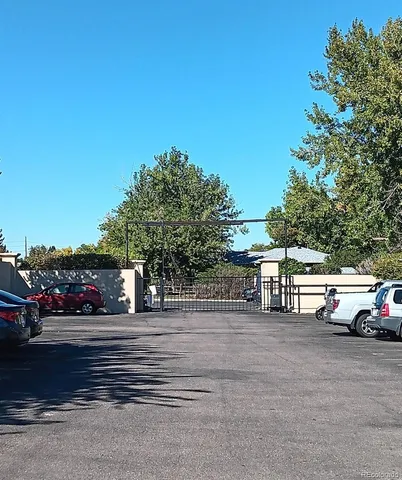 a view of street with parked cars