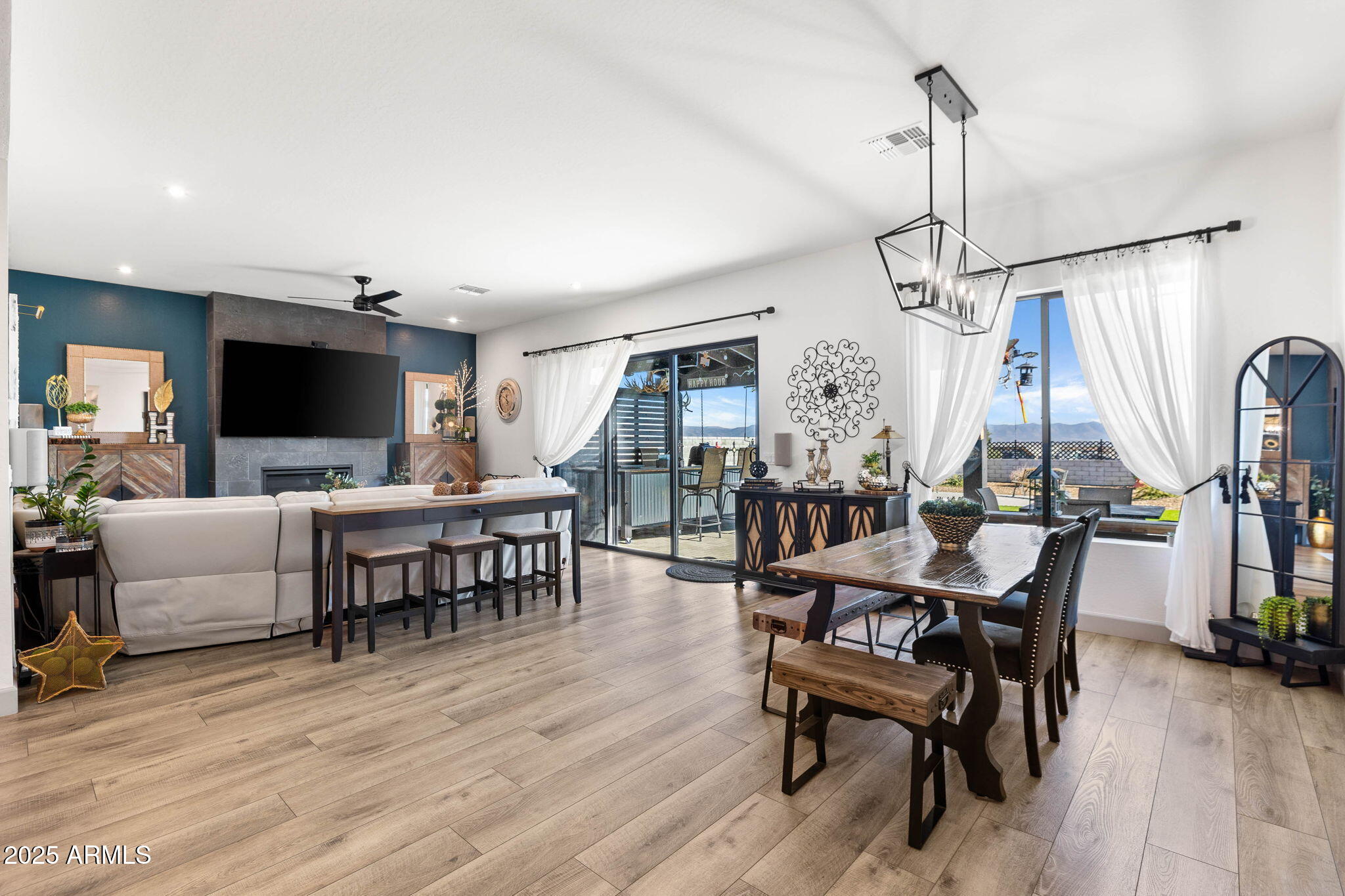 4876 North Yorkshire Loop Prescott Valley, AZ 86314 - Photo 14 of 47 a view of a livingroom with furniture and a flat screen tv