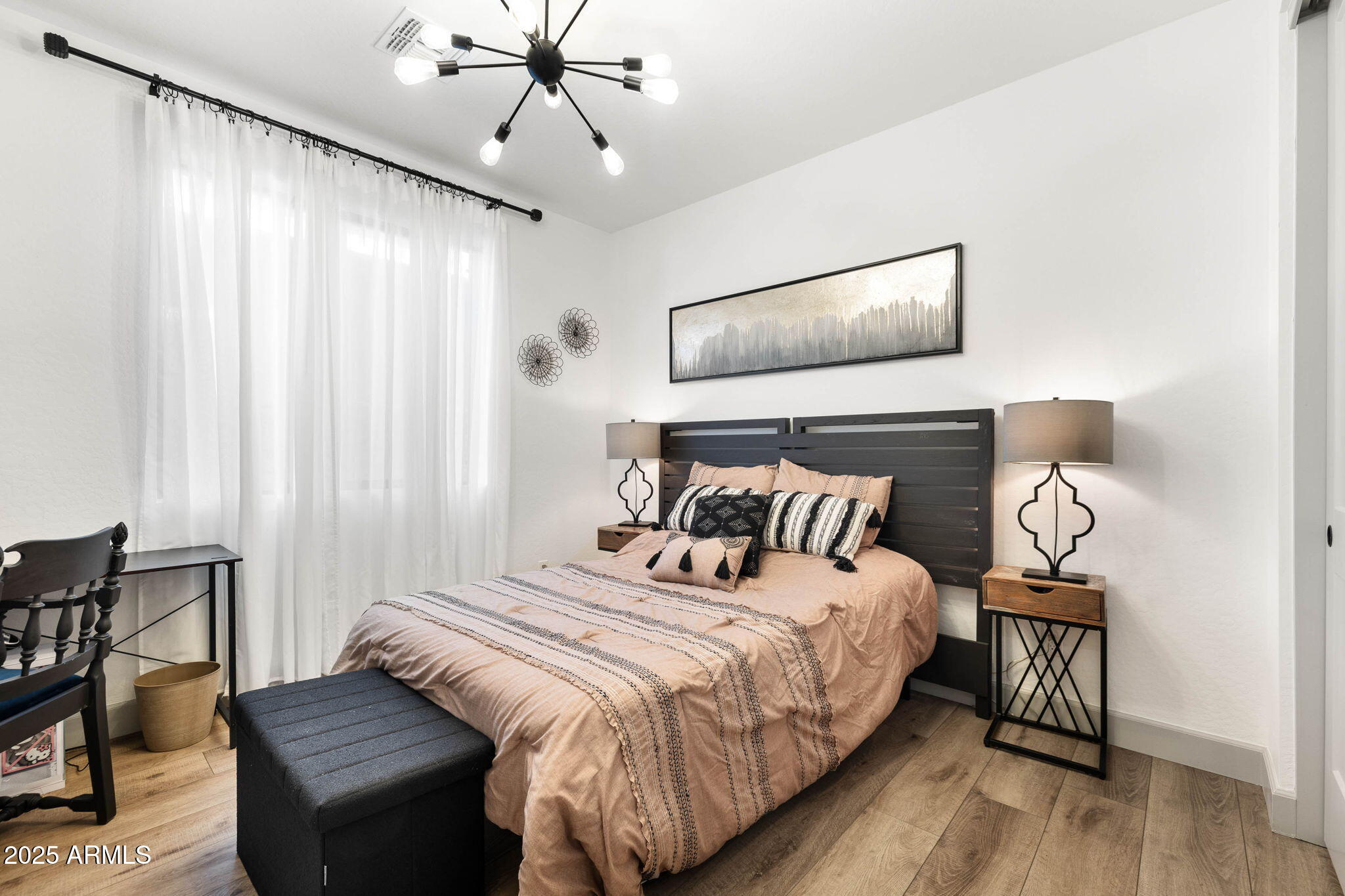 4876 North Yorkshire Loop Prescott Valley, AZ 86314 - Photo 20 of 47 a bedroom with a bed and wooden floor