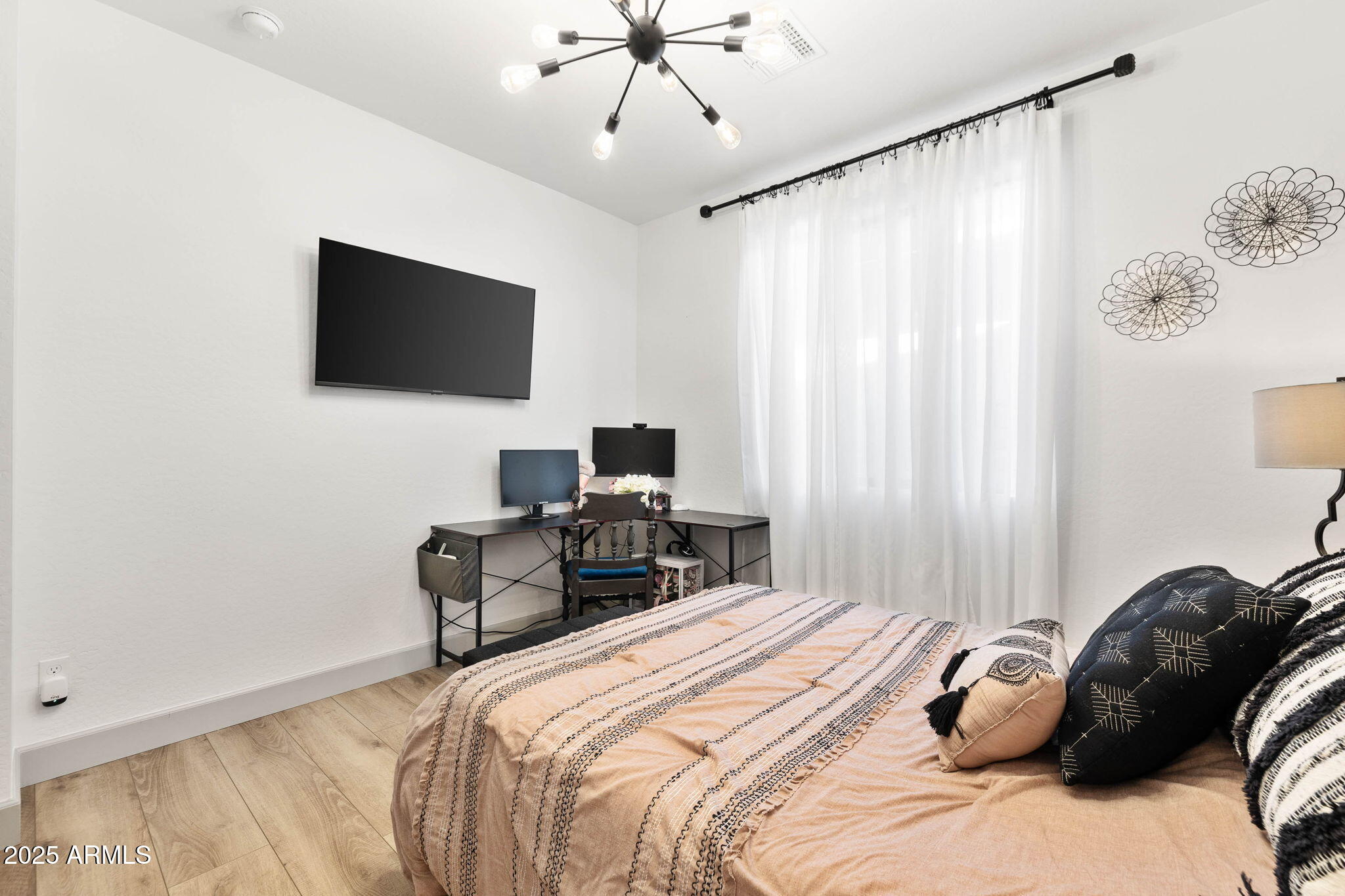 4876 North Yorkshire Loop Prescott Valley, AZ 86314 - Photo 21 of 47 a bedroom with a bed and a flat screen tv