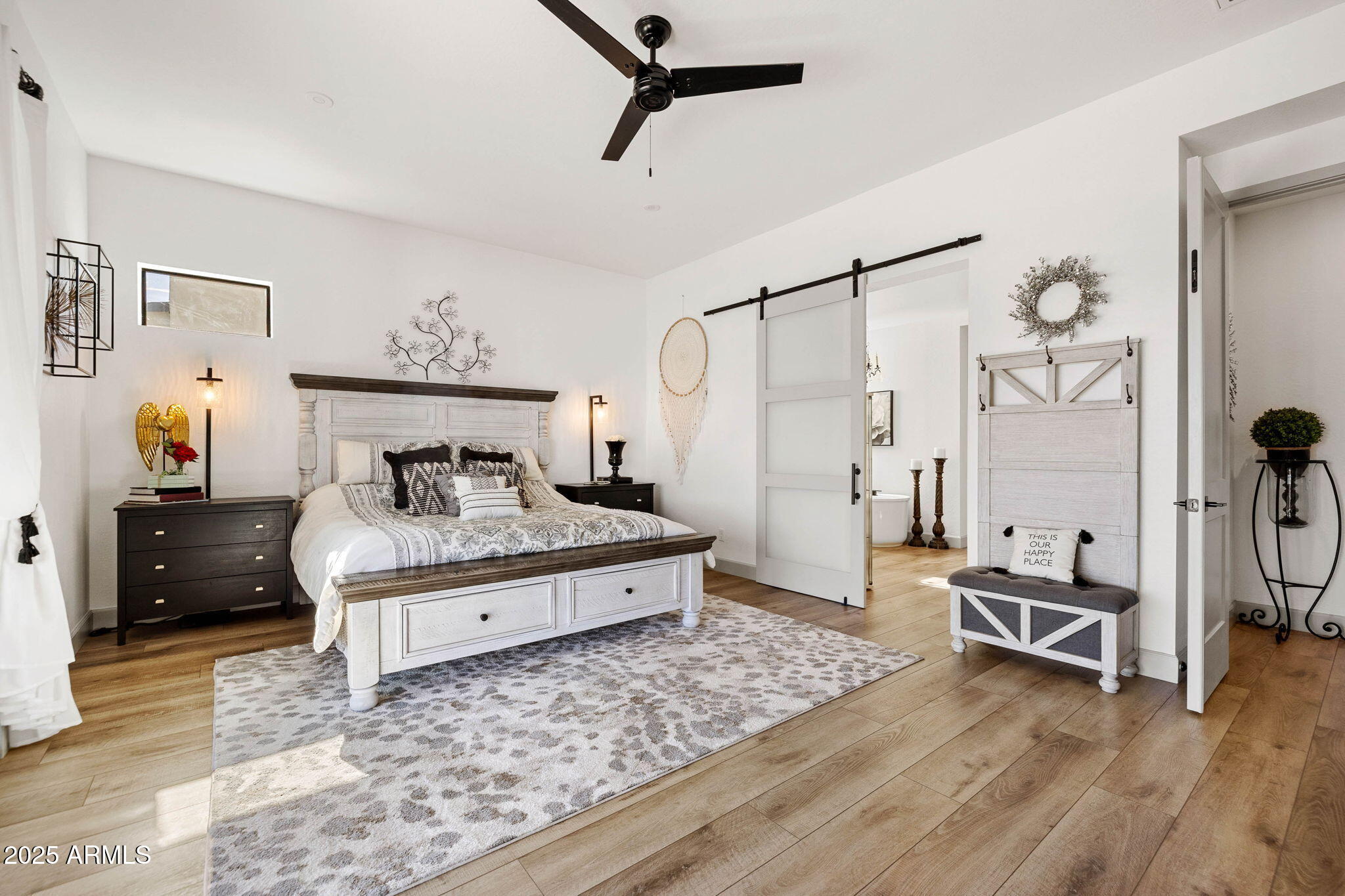 4876 North Yorkshire Loop Prescott Valley, AZ 86314 - Photo 25 of 47 a bedroom with a bed and a chandelier