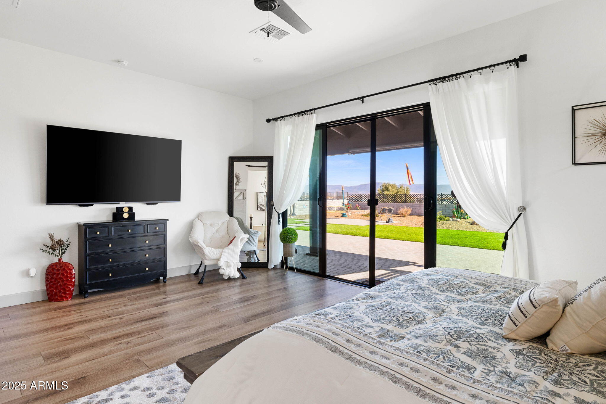 4876 North Yorkshire Loop Prescott Valley, AZ 86314 - Photo 26 of 47 a living room with furniture and a flat screen tv