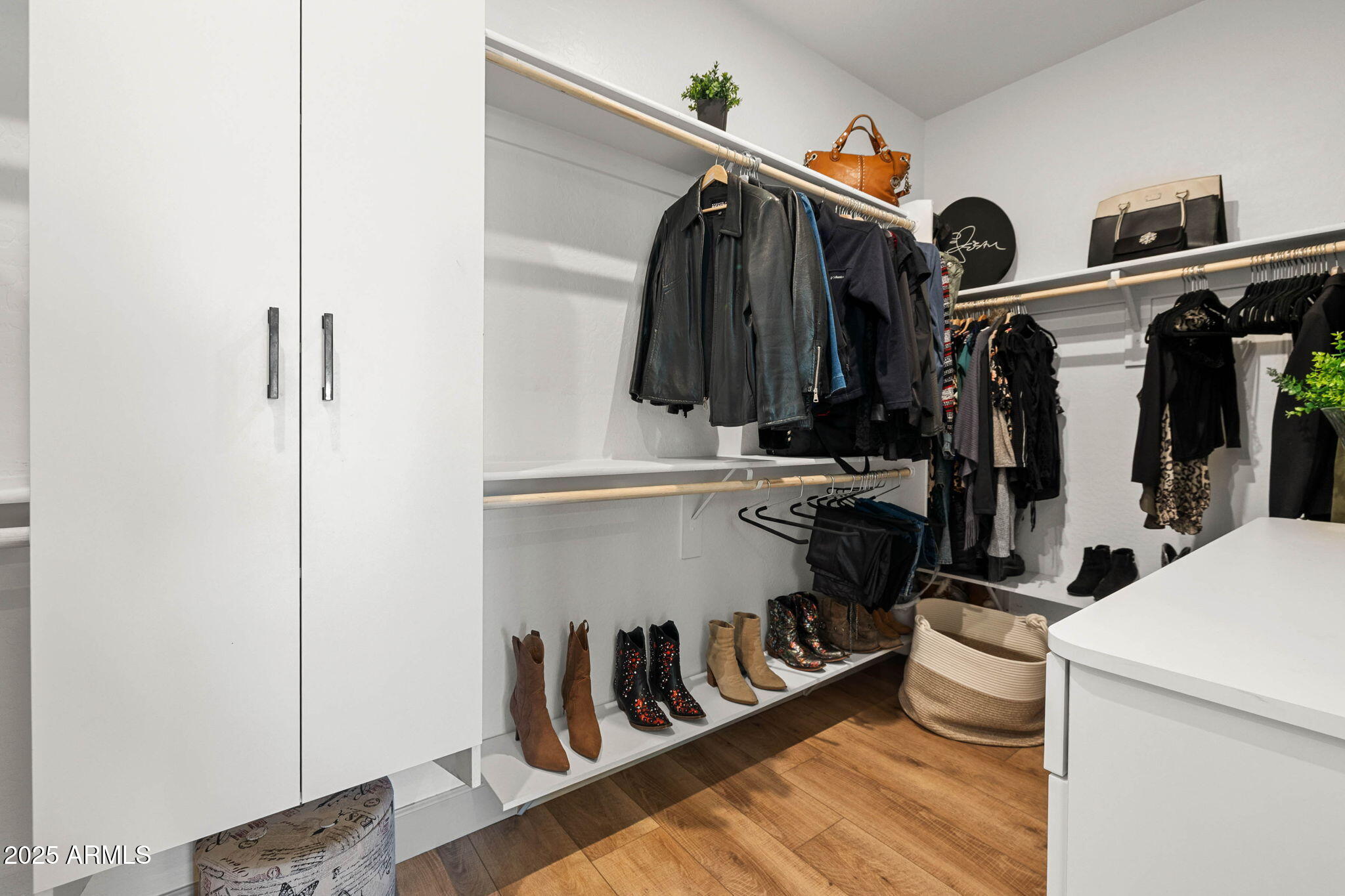4876 North Yorkshire Loop Prescott Valley, AZ 86314 - Photo 32 of 47 a view of walk in closet with clothes and shoes