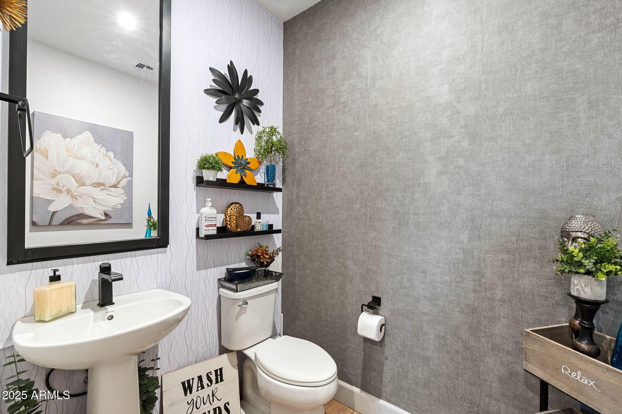 4876 North Yorkshire Loop Prescott Valley, AZ 86314 - Photo 33 of 47 a bathroom with a toilet sink and mirror