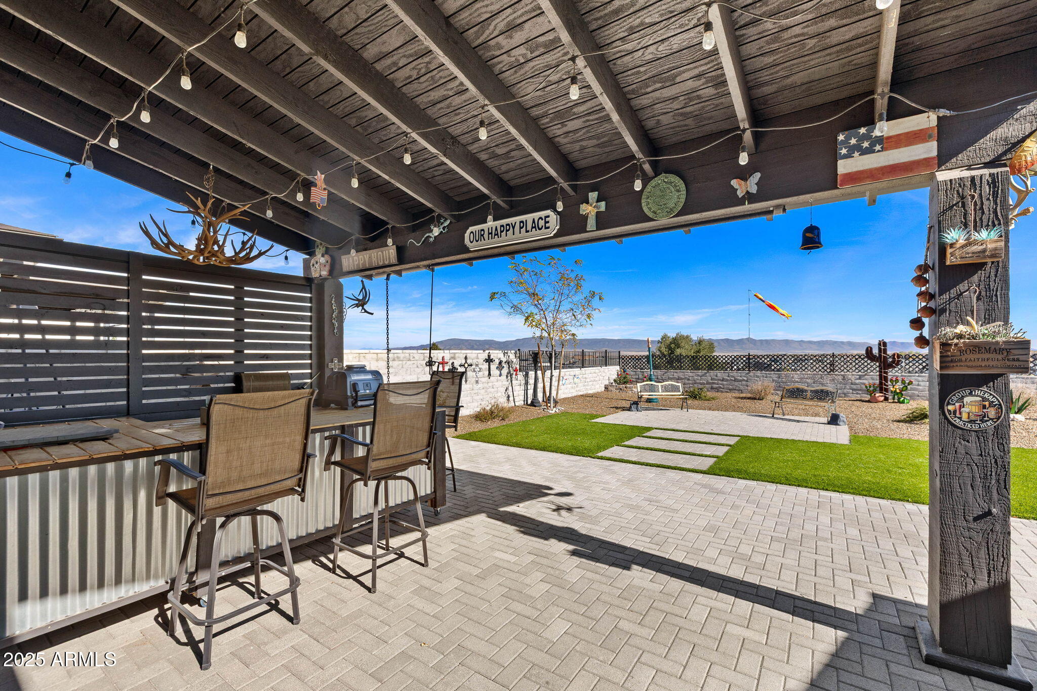 4876 North Yorkshire Loop Prescott Valley, AZ 86314 - Photo 38 of 47 a view of a chairs and table in patio