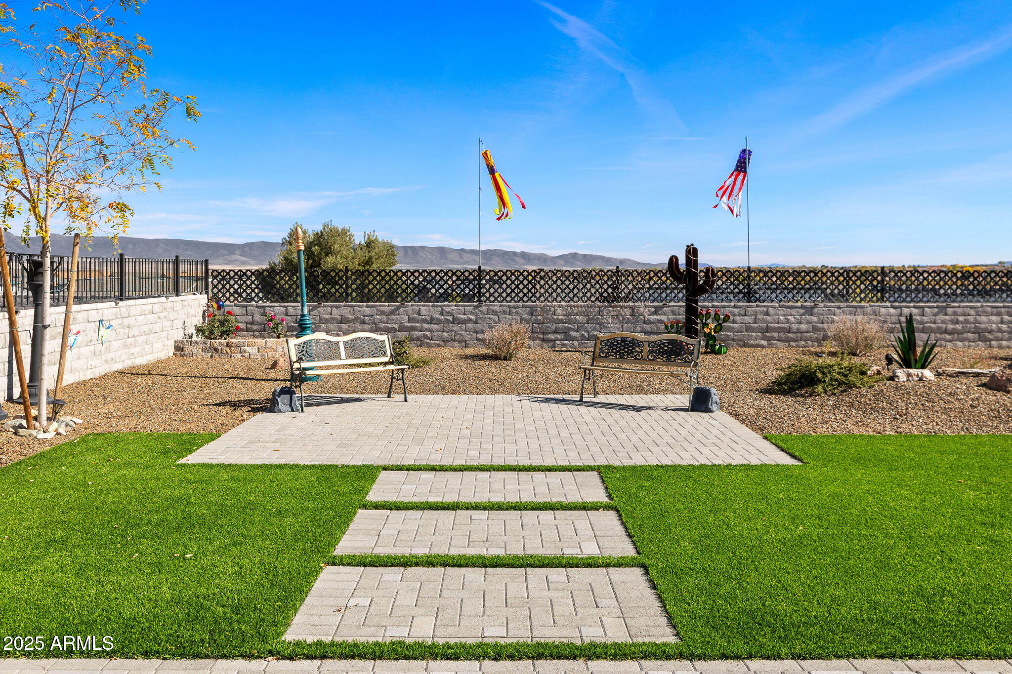 4876 North Yorkshire Loop Prescott Valley, AZ 86314 - Photo 42 of 47 a view of a backyard with a patio