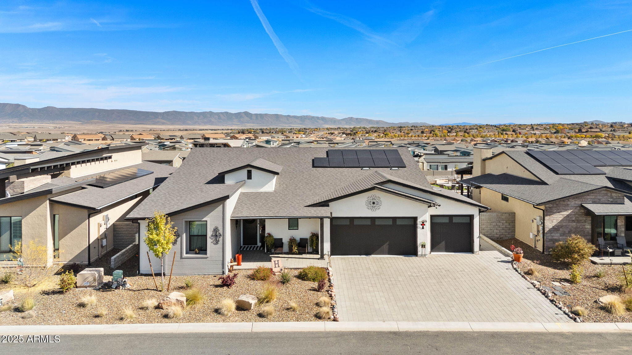 4876 North Yorkshire Loop Prescott Valley, AZ 86314 - Photo 5 of 47 a front view of a house with a yard