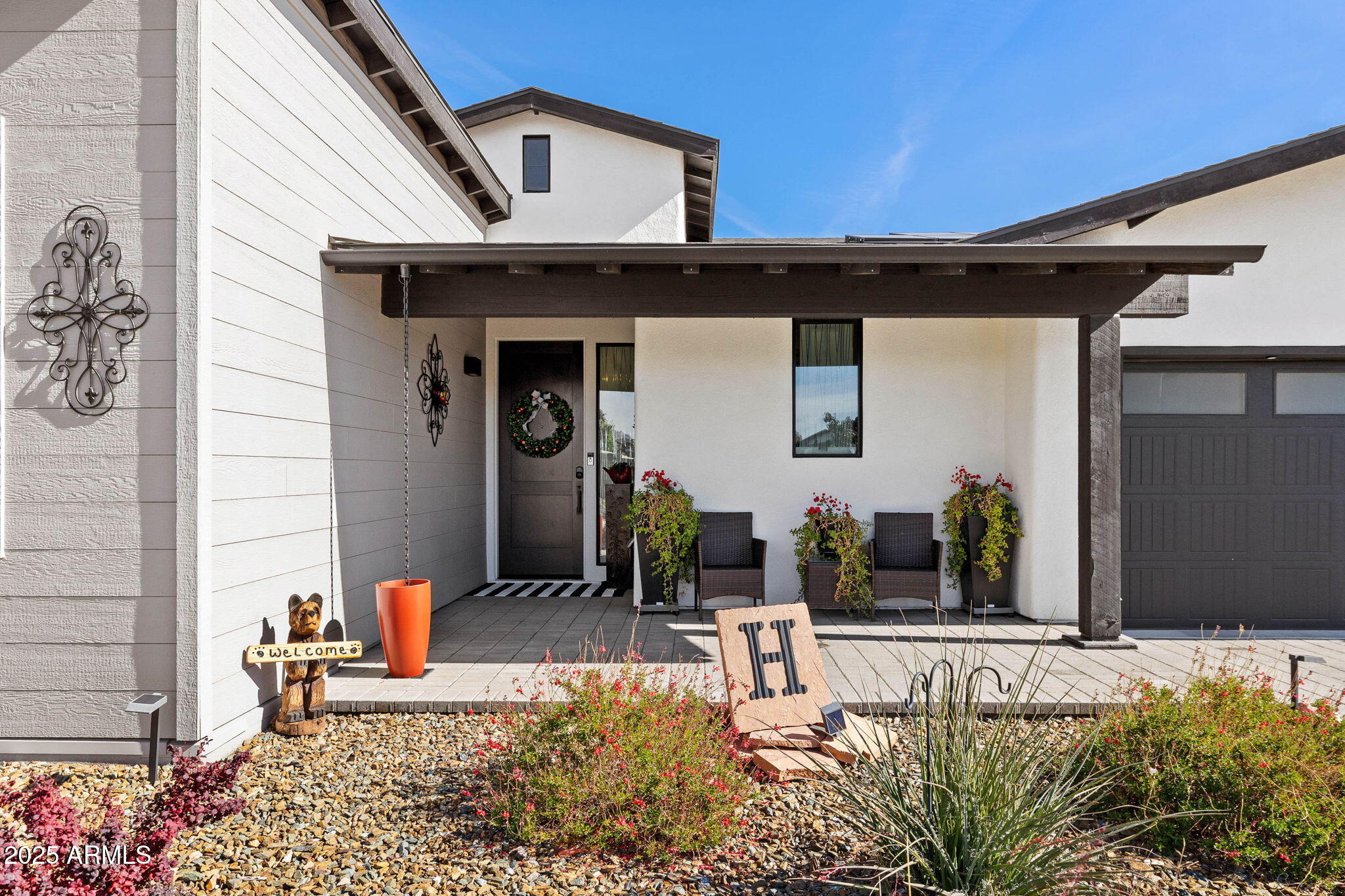 4876 North Yorkshire Loop Prescott Valley, AZ 86314 - Photo 6 of 47 a view of a entryway door front of house