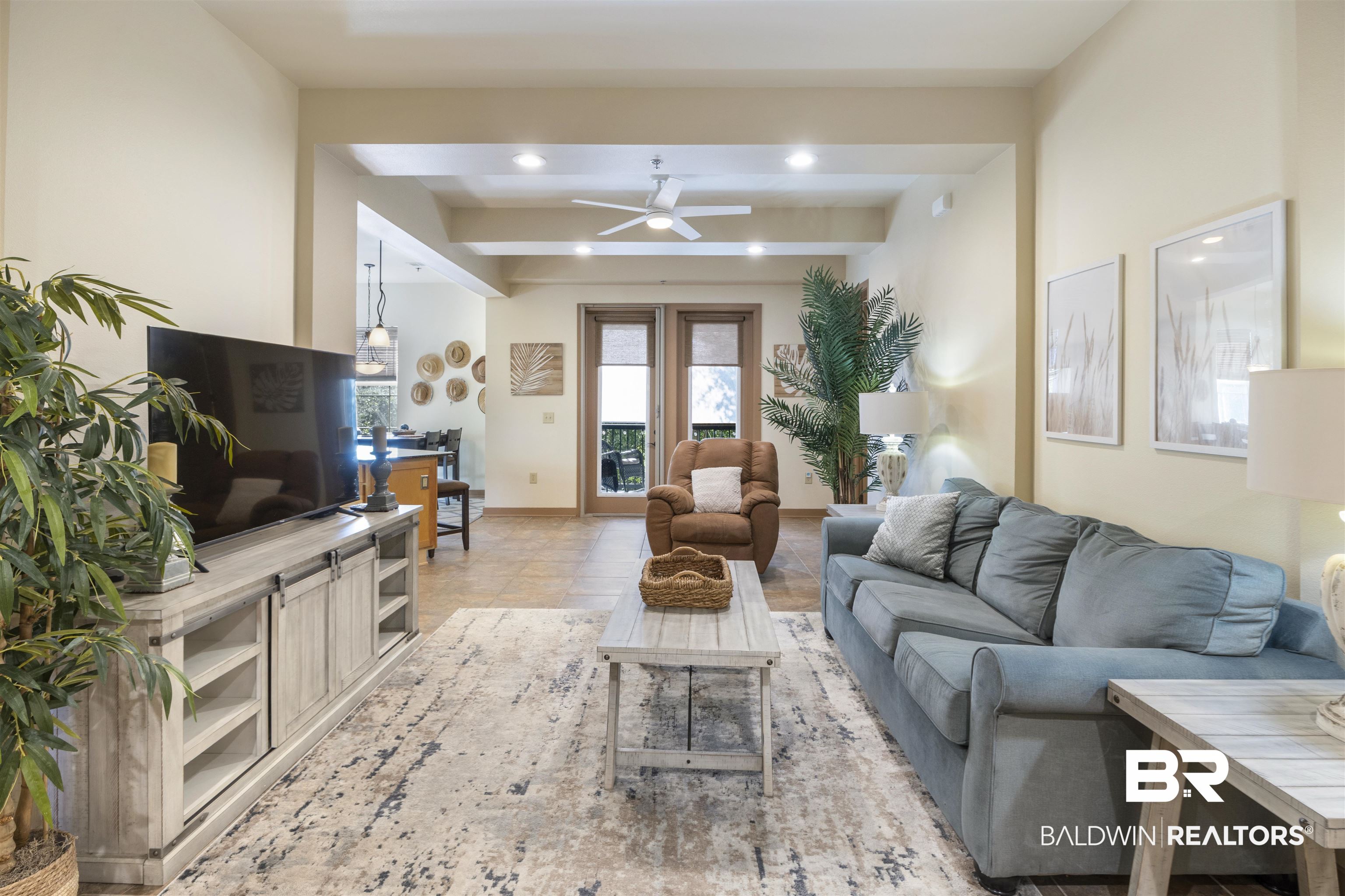 1430 Regency Road, Unit B201 Gulf Shores, AL 36542 - Photo 12 of 59 Living area with beam ceiling, a ceiling fan, and recessed lighting