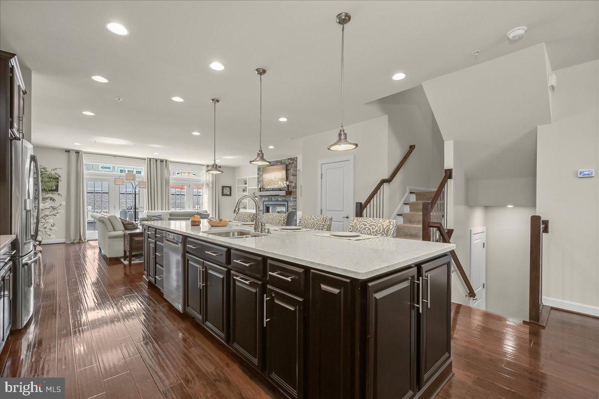 11285 Terrace Lane Fulton, MD 20759 - Photo 18 of 52 a large kitchen with lots of counter space a sink appliances and living room view