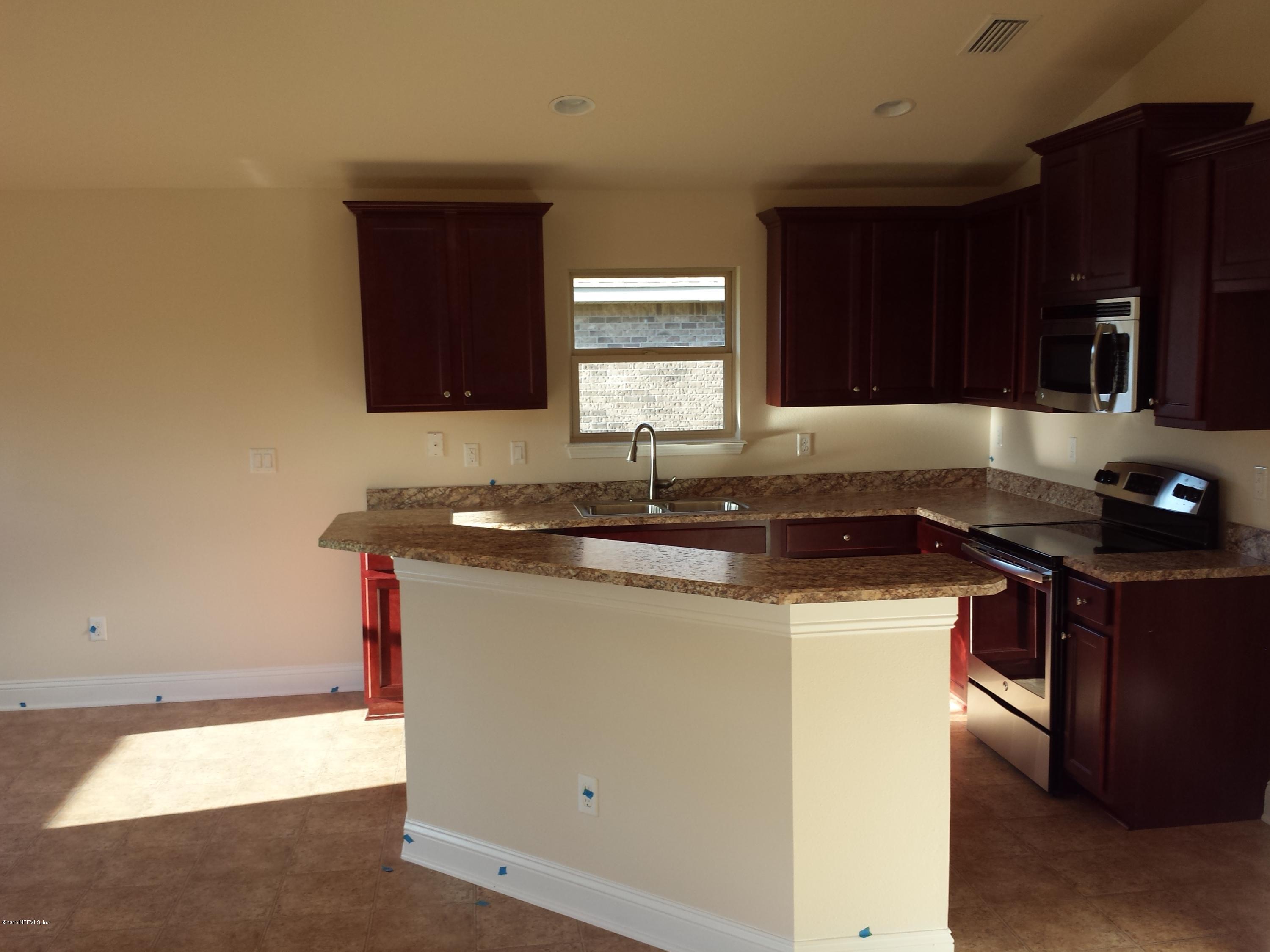 5819 Royalty Road Jacksonville, FL 32254 - Photo 5 of 5 Kitchen with Breakfast Bar