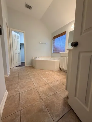 a view of kitchen with furniture and wooden floor