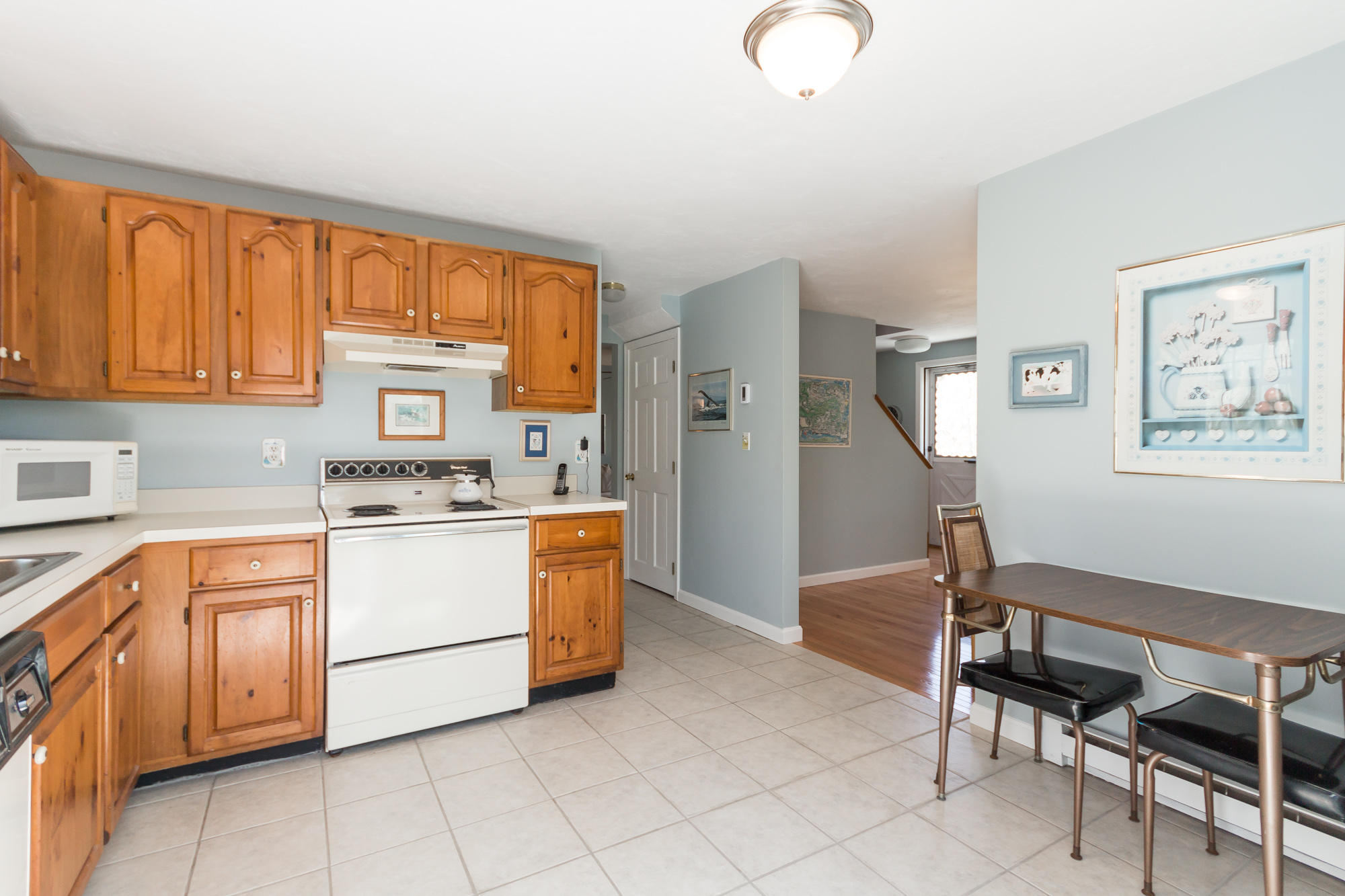 74 Saddle Club Road Edgartown, MA 02539 - Photo 7 of 18 Eat in kitchen to dining room