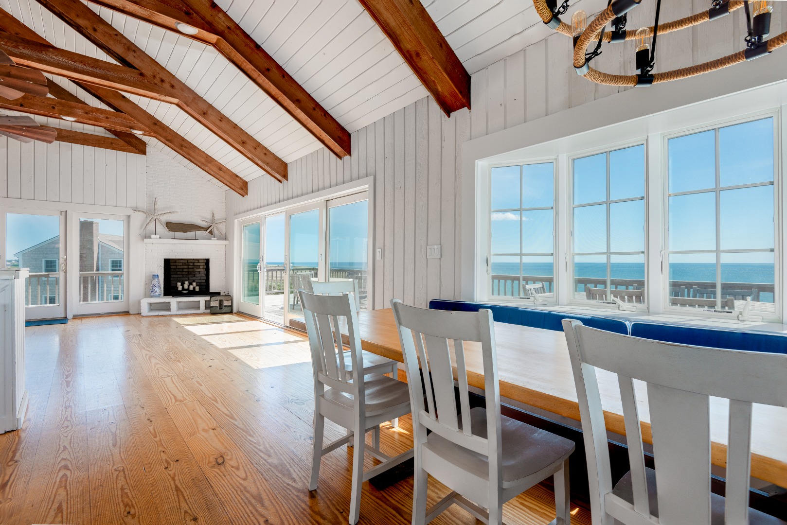 1 Reeds Way Nantucket, MA 02554 - Photo 25 of 51 a dining room with wooden floor and large window