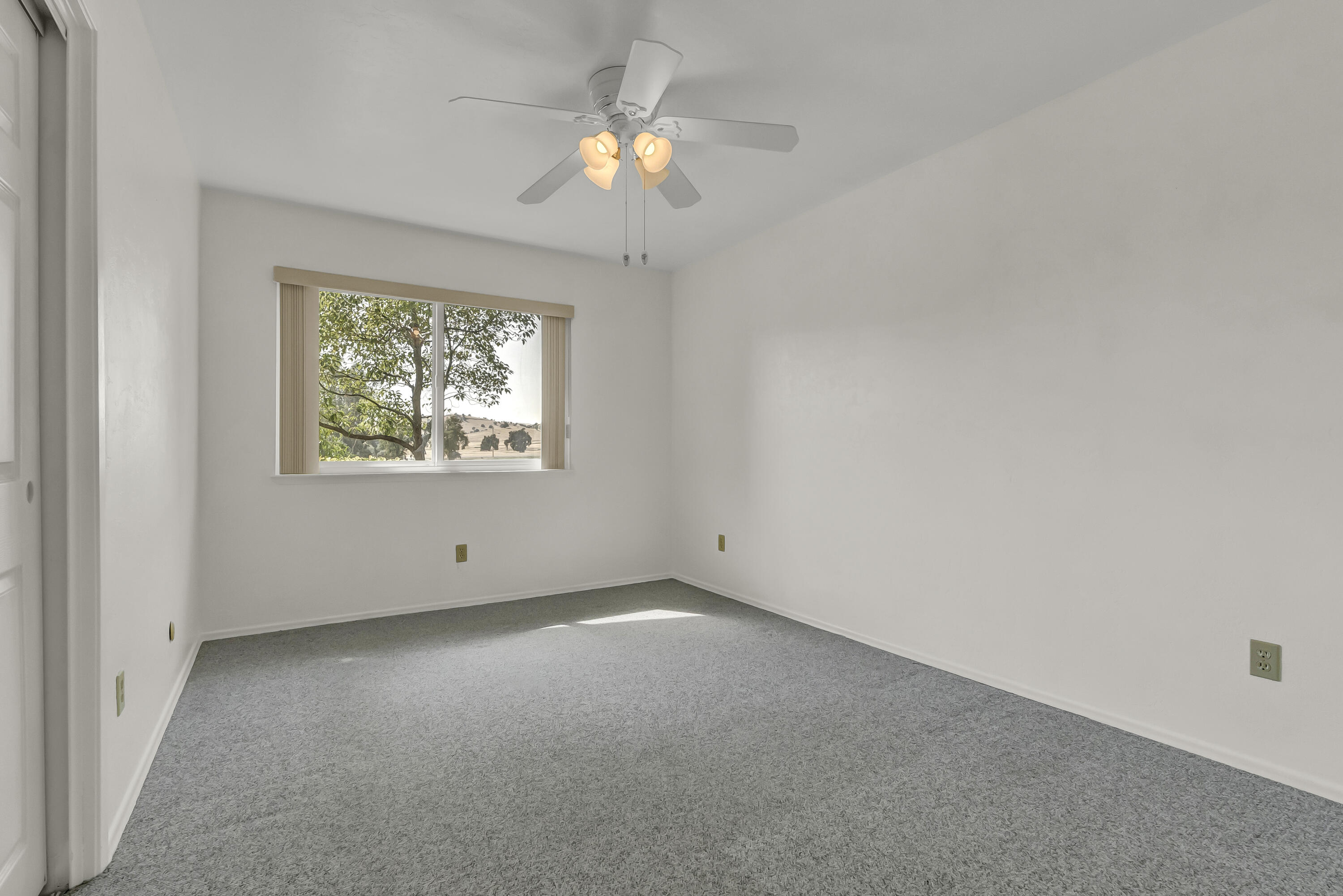 18002 320th Road Springville, CA 93265 - Photo 31 of 56 an empty room with a window