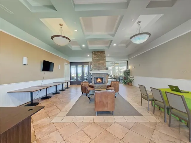 a view of a dining room with furniture window and outside view