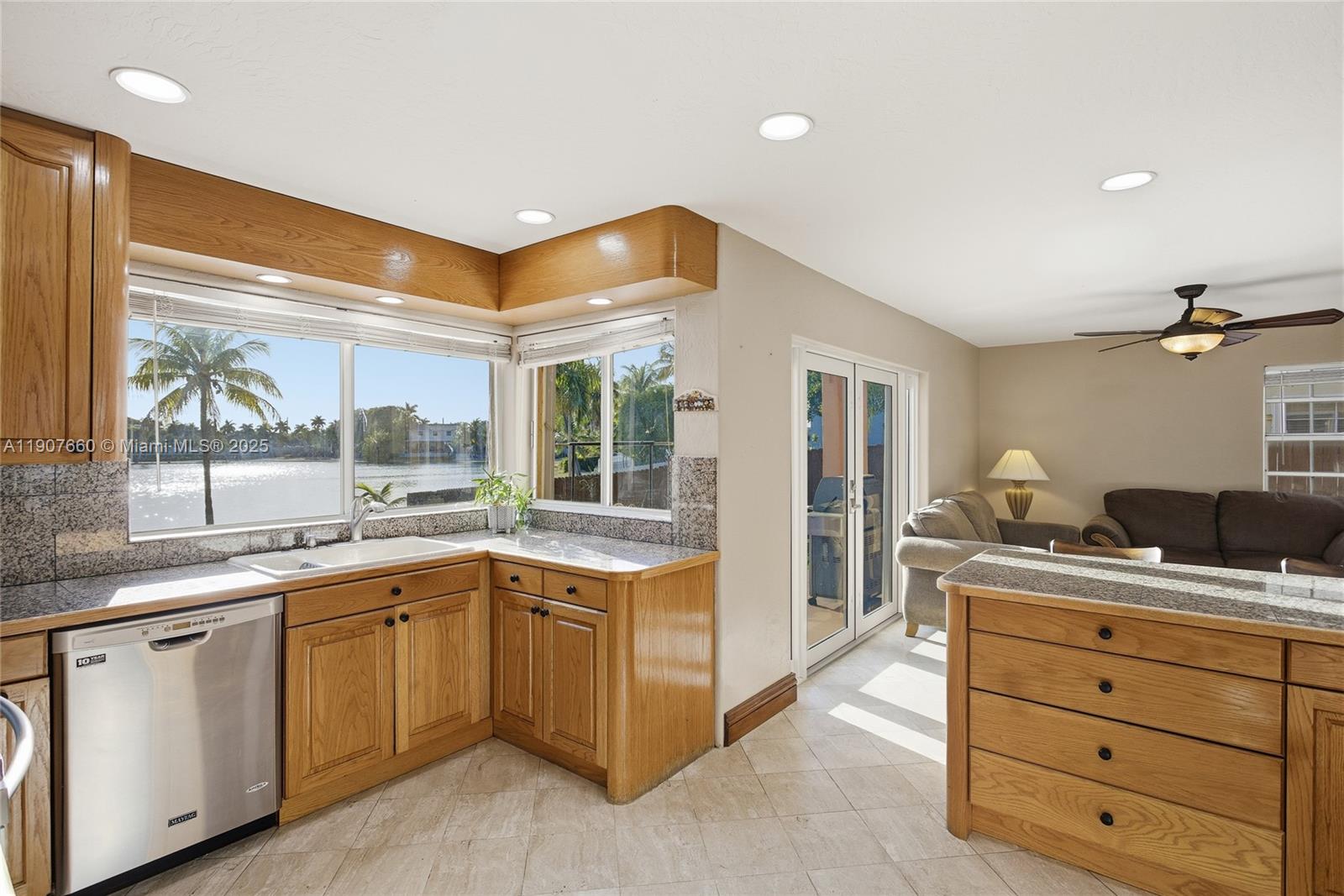 20816 Southwest 85th Place Cutler Bay, FL 33189 - Photo 18 of 49 a kitchen with a sink and cabinets