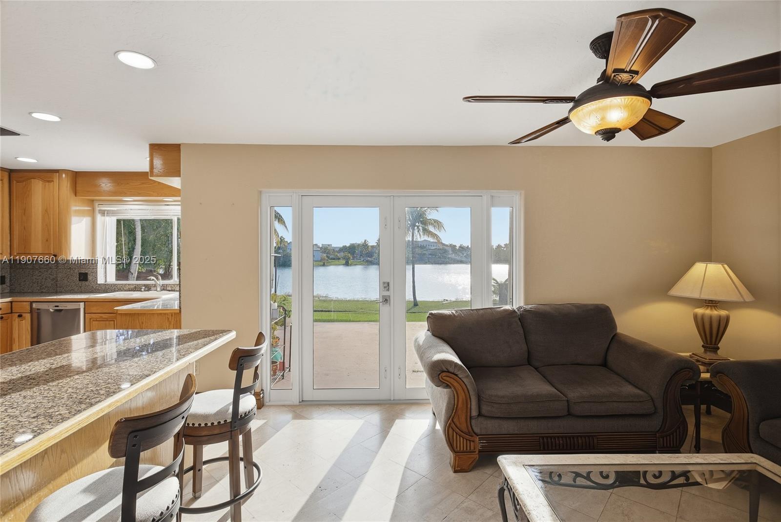 20816 Southwest 85th Place Cutler Bay, FL 33189 - Photo 23 of 49 a living room with furniture and a large window