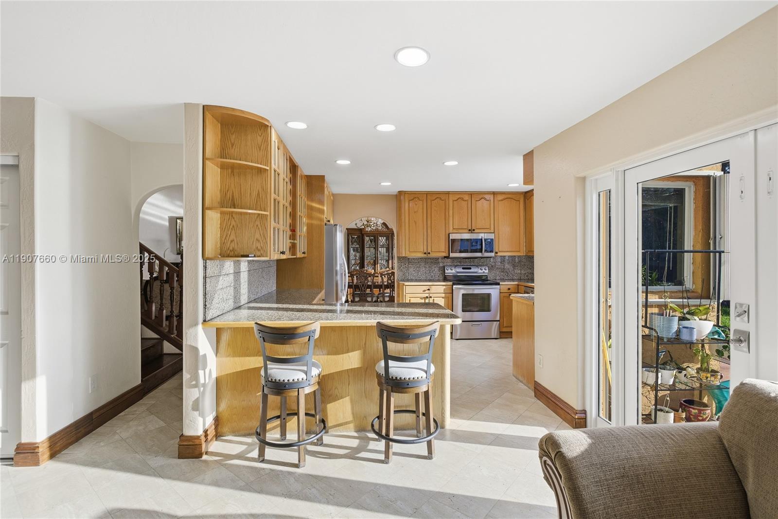 20816 Southwest 85th Place Cutler Bay, FL 33189 - Photo 25 of 49 a view of a dining room with furniture
