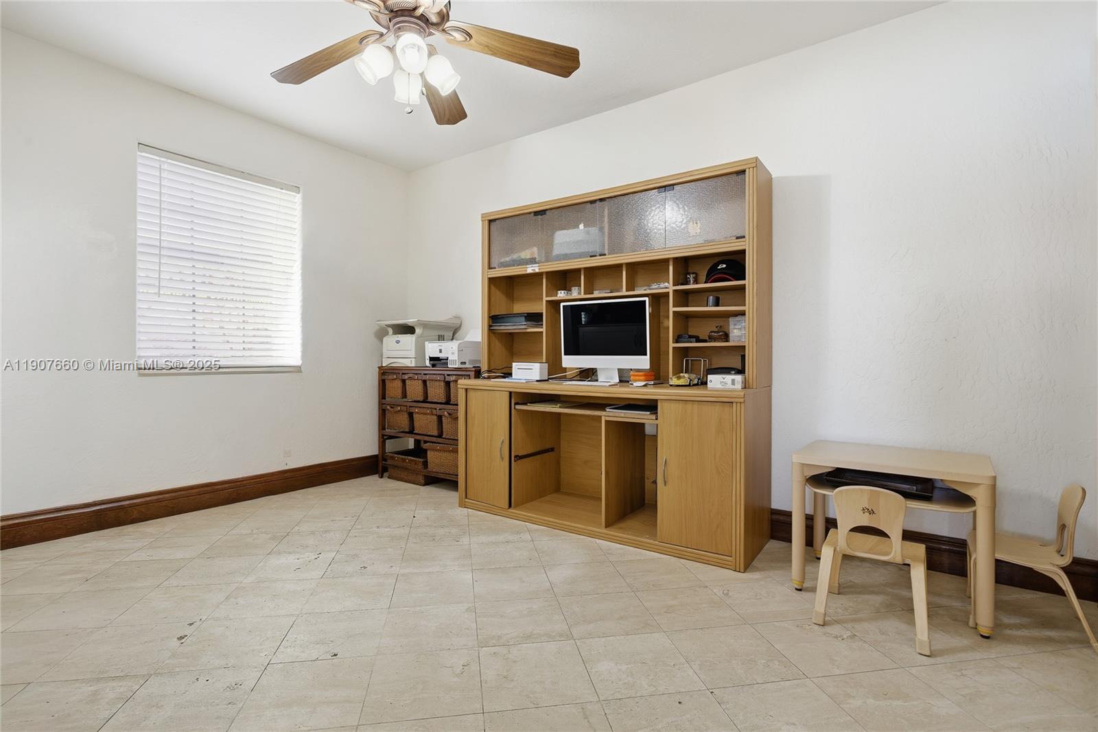 20816 Southwest 85th Place Cutler Bay, FL 33189 - Photo 26 of 49 a kitchen with a stove cabinets and microwave