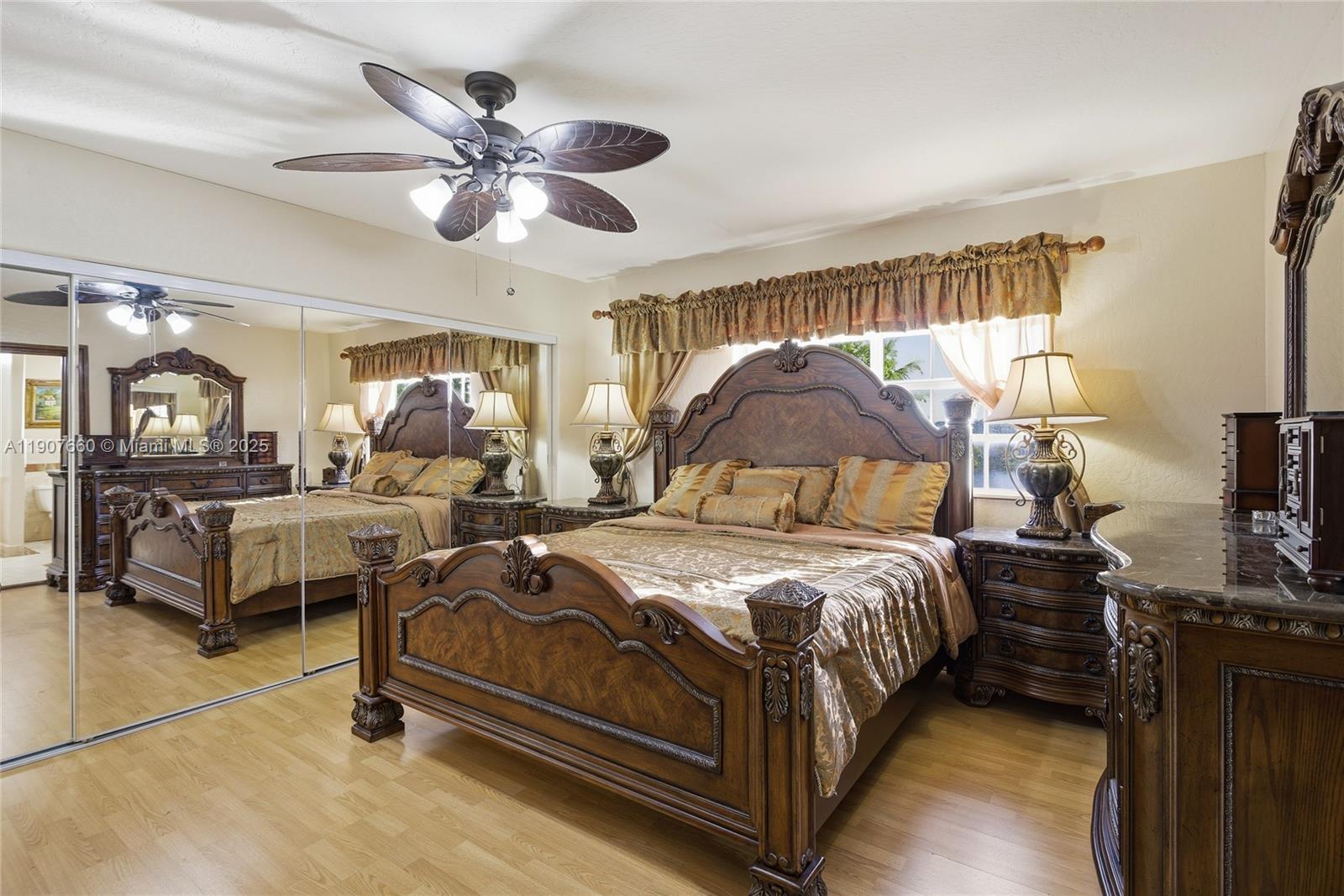 20816 Southwest 85th Place Cutler Bay, FL 33189 - Photo 29 of 49 a bedroom with bed and window