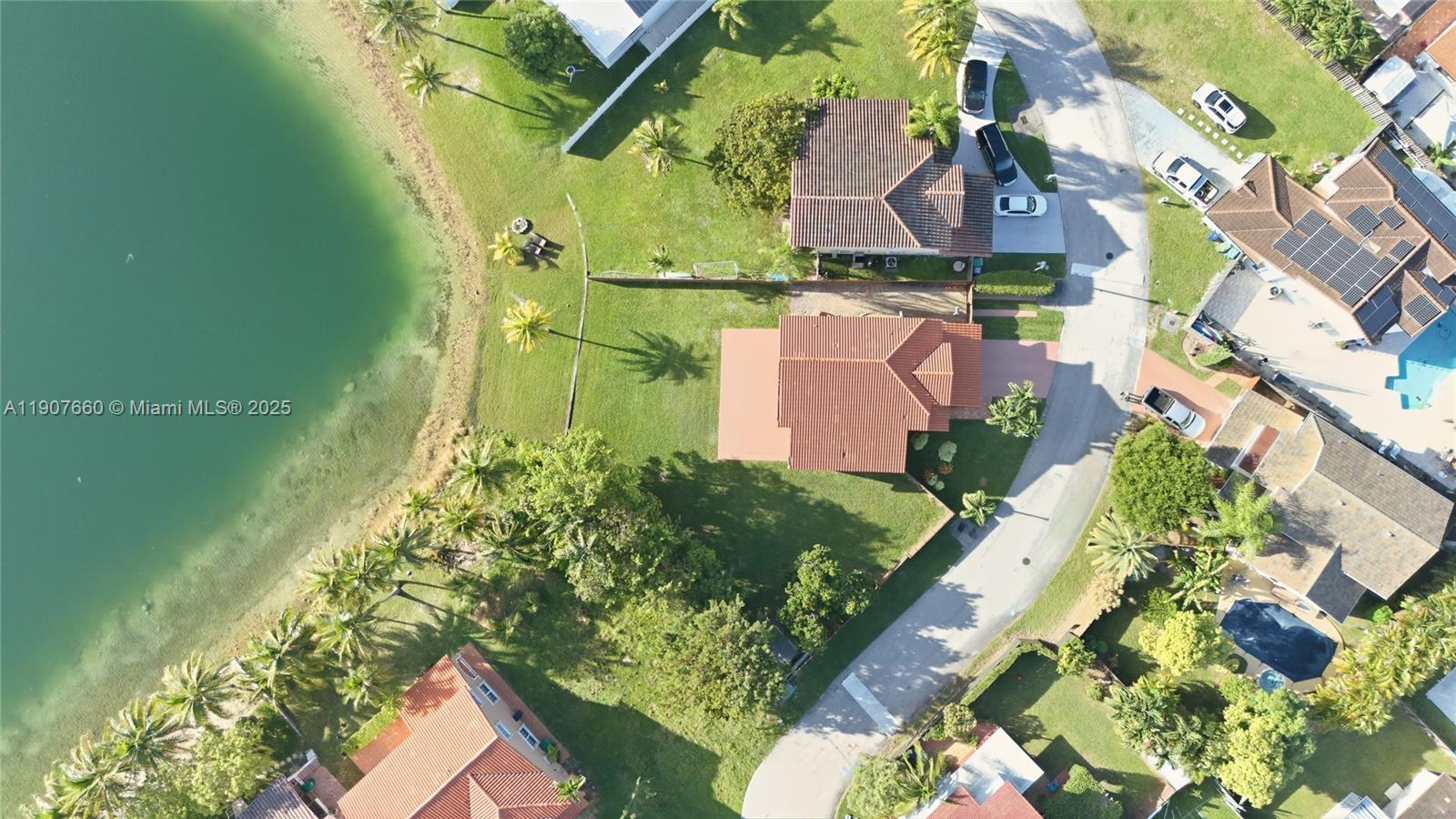 20816 Southwest 85th Place Cutler Bay, FL 33189 - Photo 5 of 49 an aerial view of a house with a yard