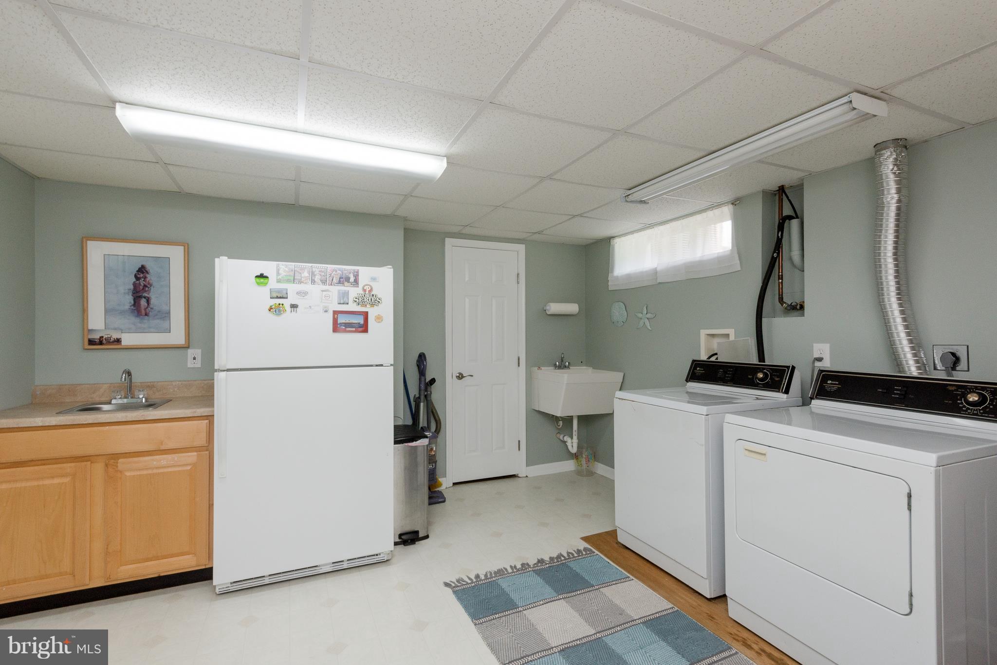 84 Old Solomons Island Road Lothian, MD 20711 - Photo 17 of 28 Laundry room and basement entrance