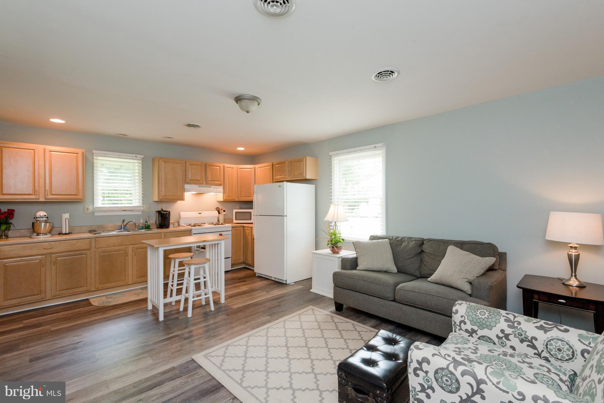 84 Old Solomons Island Road Lothian, MD 20711 - Photo 19 of 28 Guest house living room and kitchen