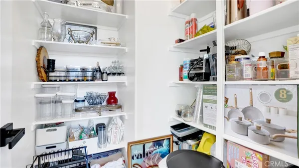 a cabinet with wooden floor and cabinets