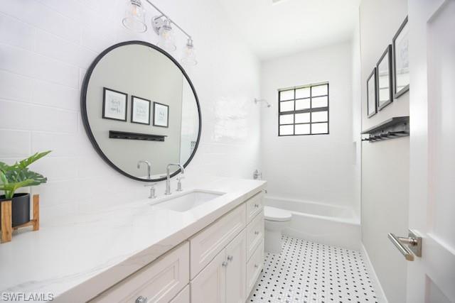 Undisclosed Address Naples, FL 34110 - Photo 11 of 18 a bathroom with a sink a mirror and a shower