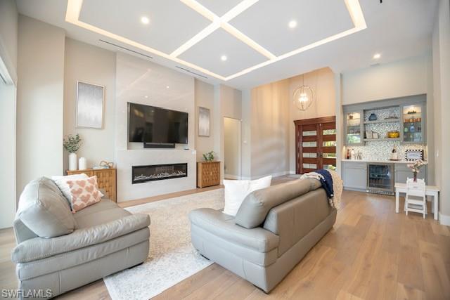 Undisclosed Address Naples, FL 34110 - Photo 7 of 18 a living room with furniture and a flat screen tv