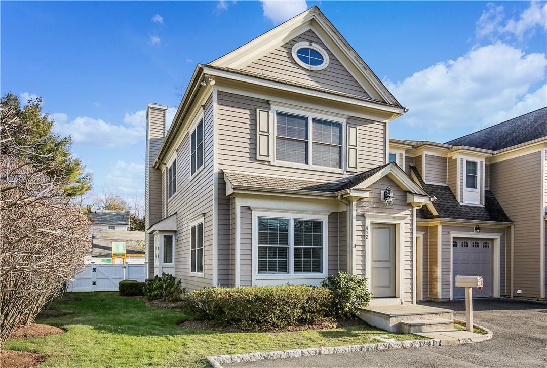 412 Midland Avenue Rye, NY 10580 - Photo 1 of 1 a front view of a house with a yard