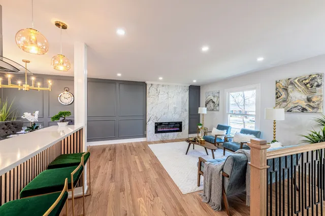 a view of a living room and a wooden floor