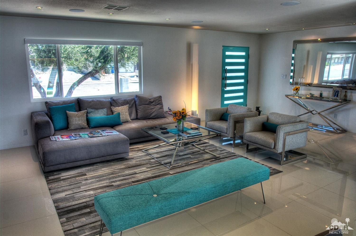 465 East Simms Road Palm Springs, CA 92262 - Photo 14 of 41 a living room with furniture and a large window