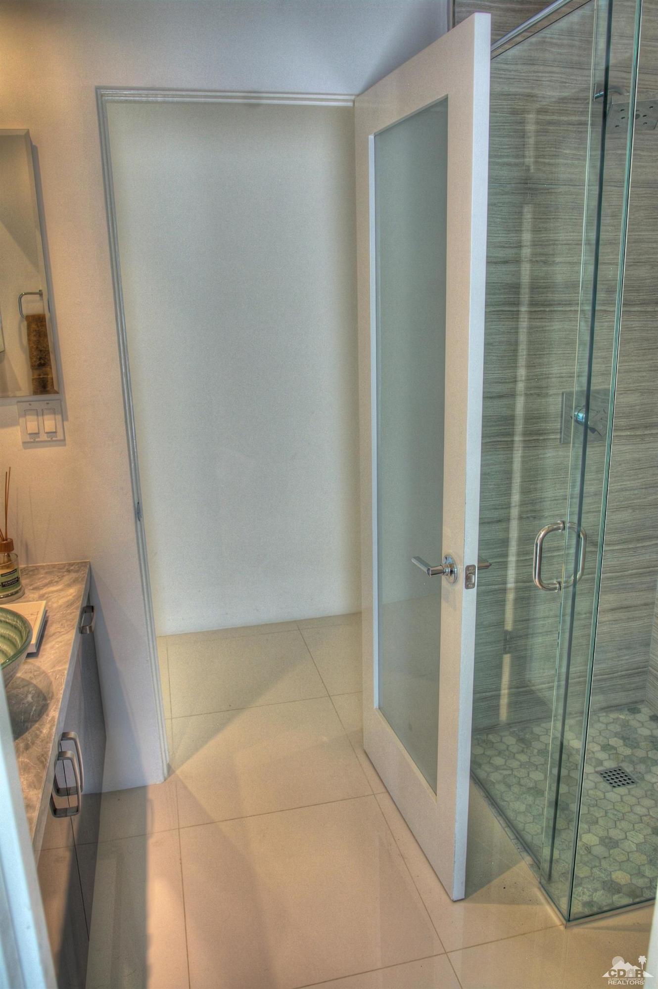 465 East Simms Road Palm Springs, CA 92262 - Photo 24 of 41 a bathroom with a shower