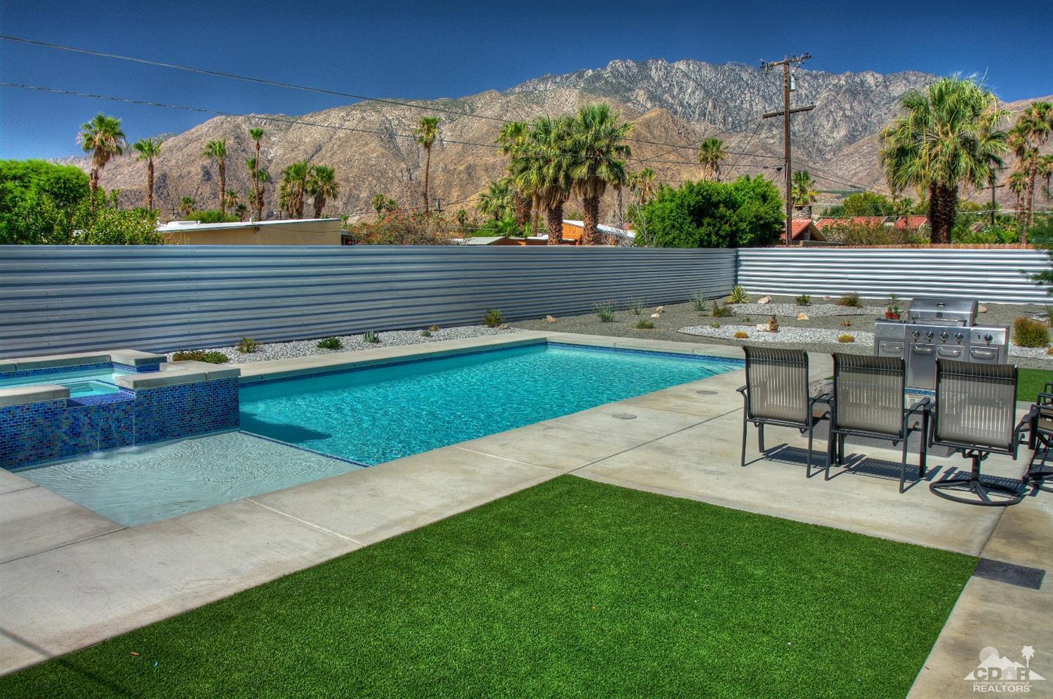 465 East Simms Road Palm Springs, CA 92262 - Photo 30 of 41 a view of a terrace with chairs