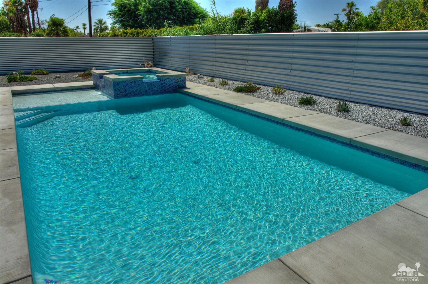 465 East Simms Road Palm Springs, CA 92262 - Photo 33 of 41 a backyard view with a seating space