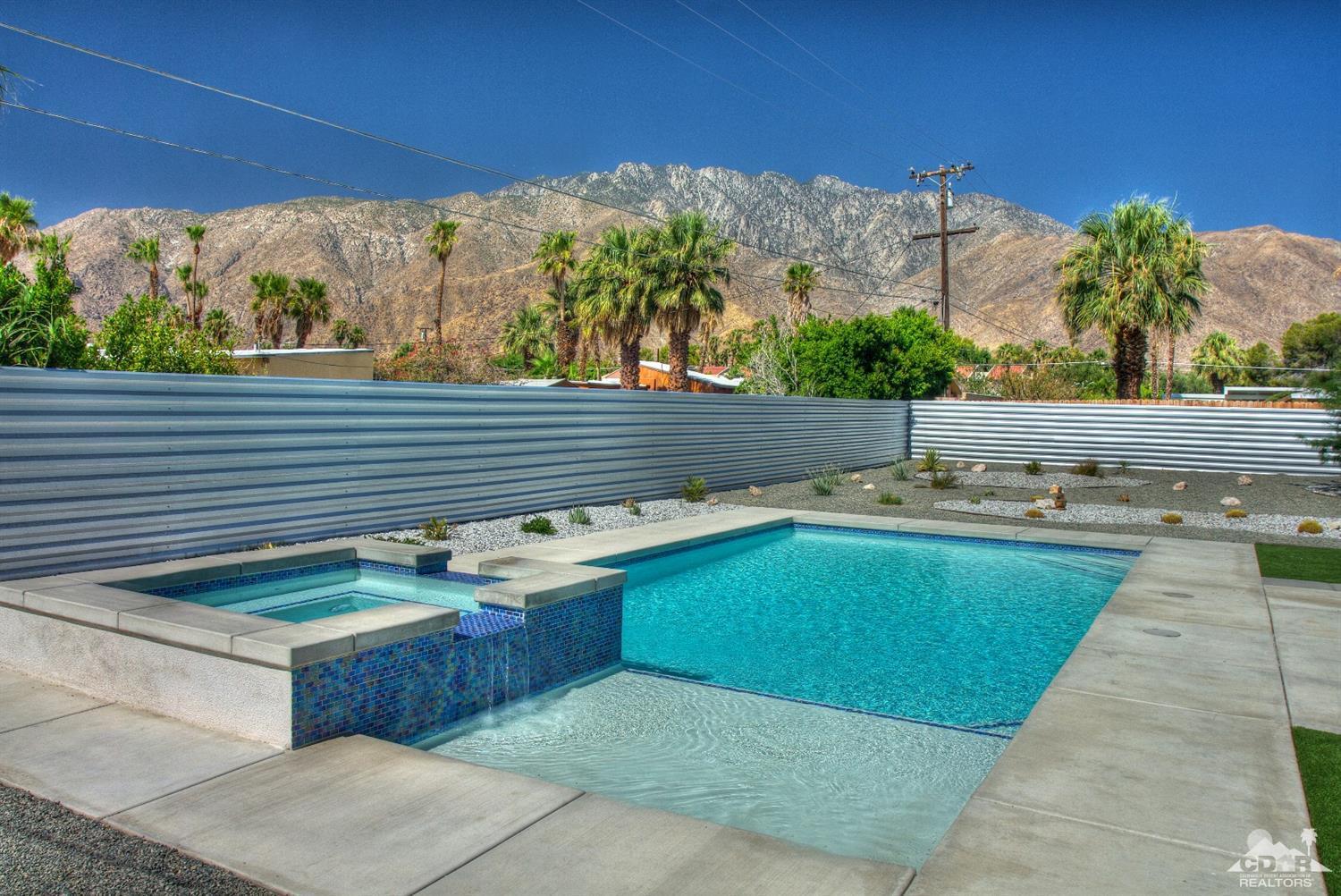 465 East Simms Road Palm Springs, CA 92262 - Photo 34 of 41 a view of a swimming pool with a patio