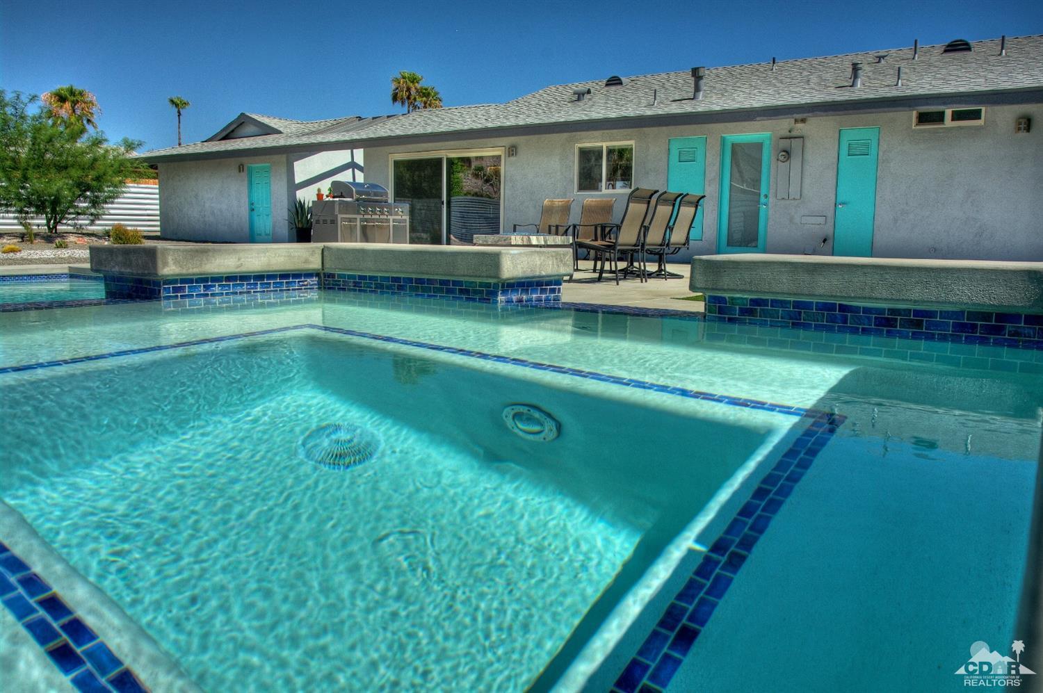 465 East Simms Road Palm Springs, CA 92262 - Photo 36 of 41 a view of a house with a yard
