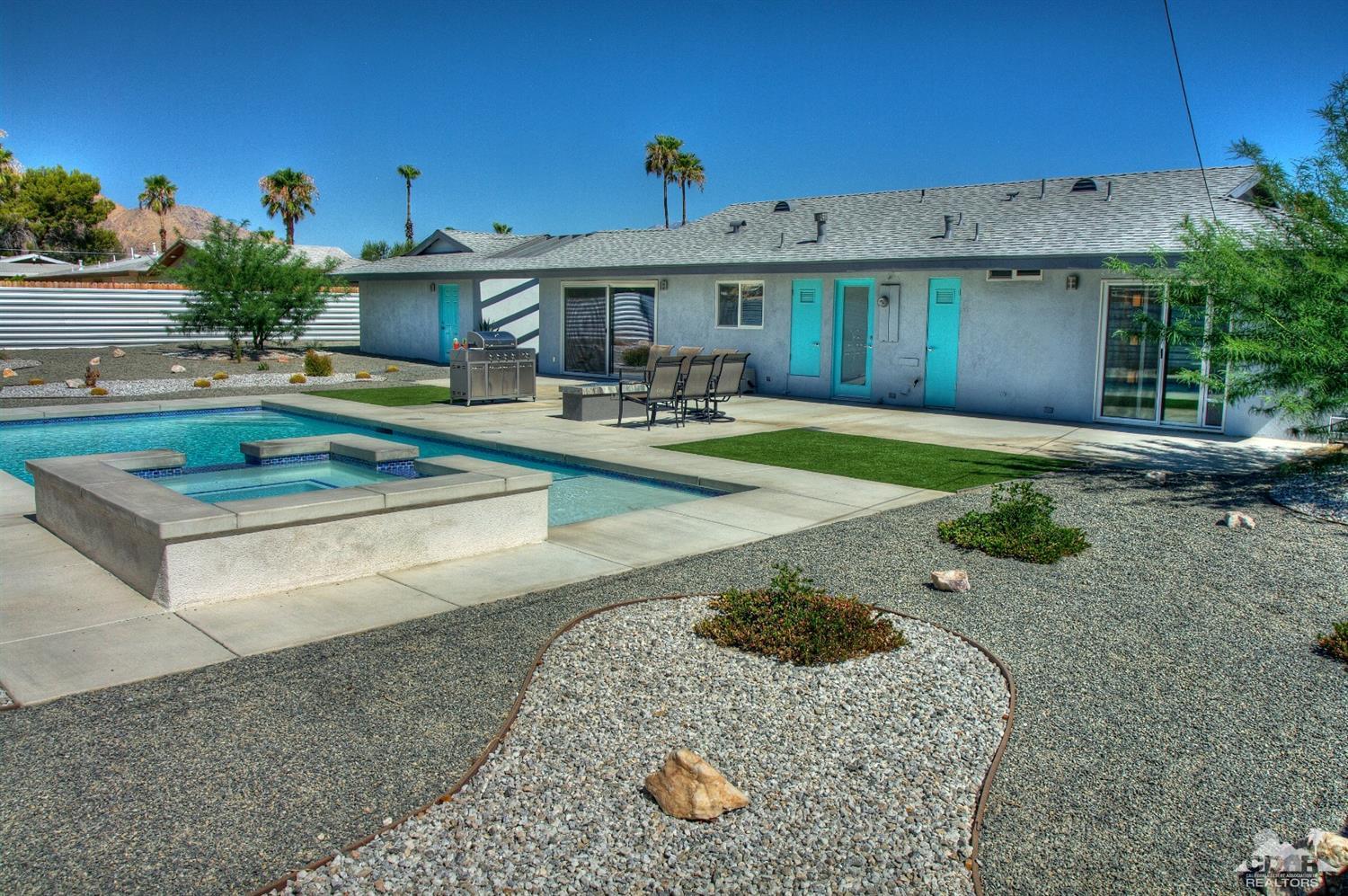 465 East Simms Road Palm Springs, CA 92262 - Photo 38 of 41 a view of a house with backyard patio and swimming pool