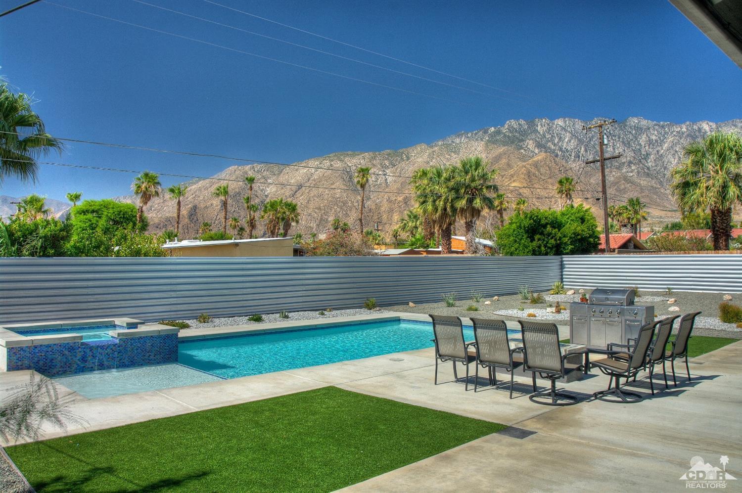 465 East Simms Road Palm Springs, CA 92262 - Photo 5 of 41 a view of a chairs and table in patio