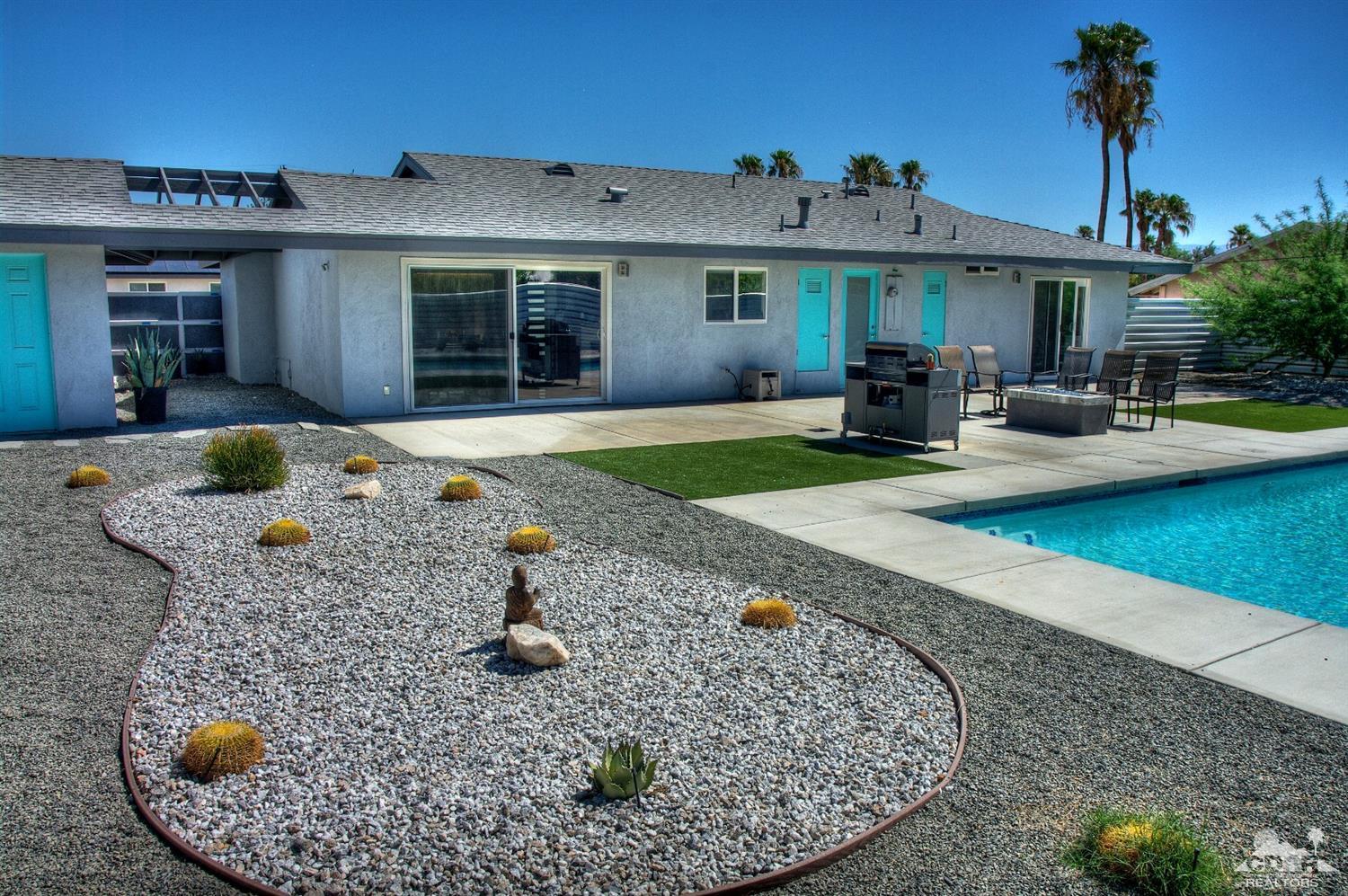 465 East Simms Road Palm Springs, CA 92262 - Photo 41 of 41 a front view of a house with swimming pool