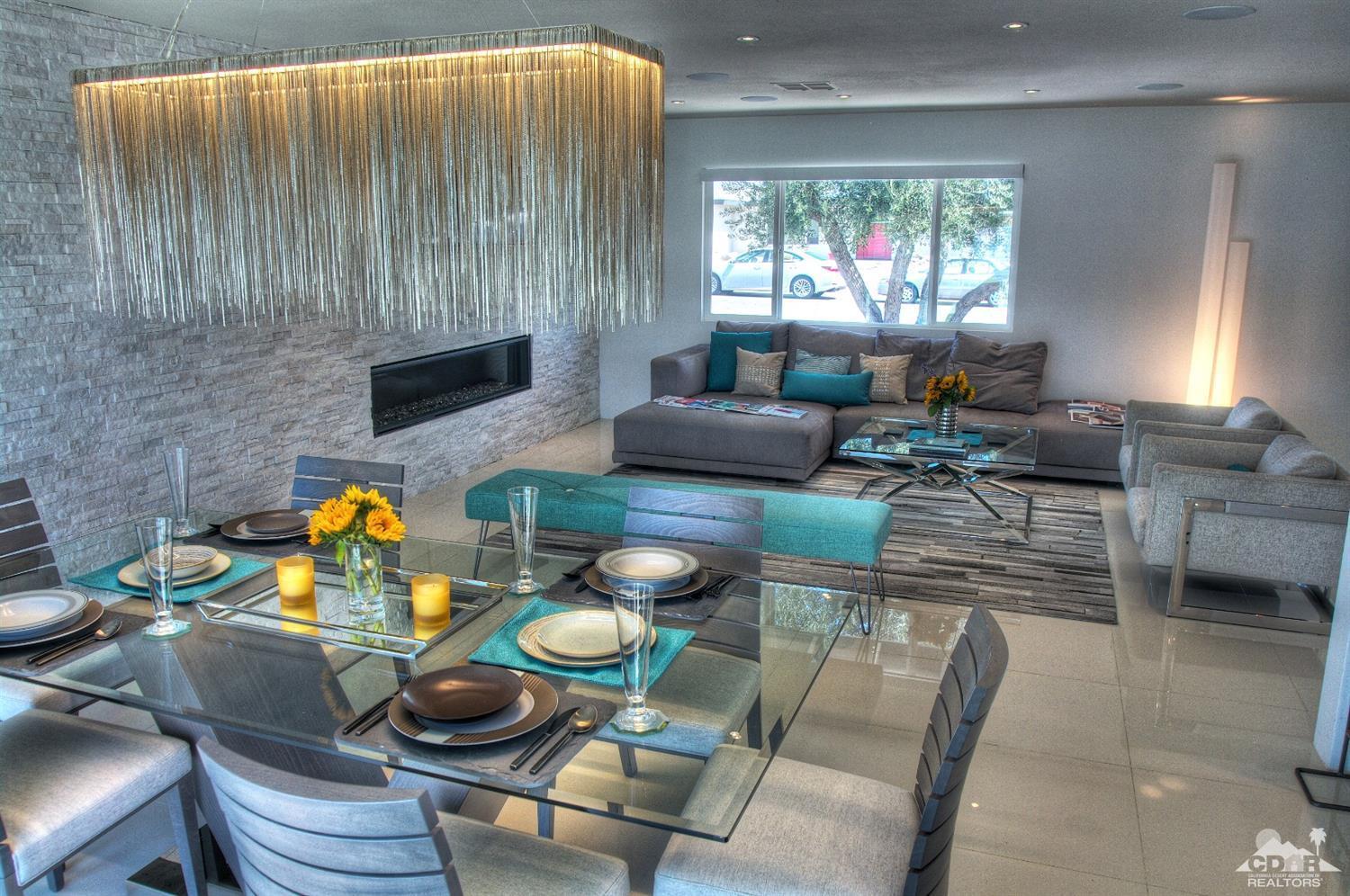 465 East Simms Road Palm Springs, CA 92262 - Photo 10 of 41 a living room with furniture and a fireplace