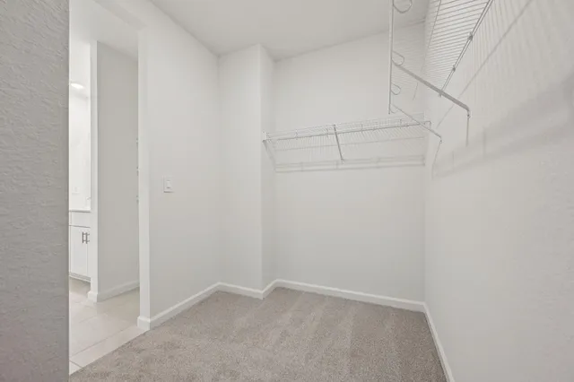 a view of an empty walk in closet
