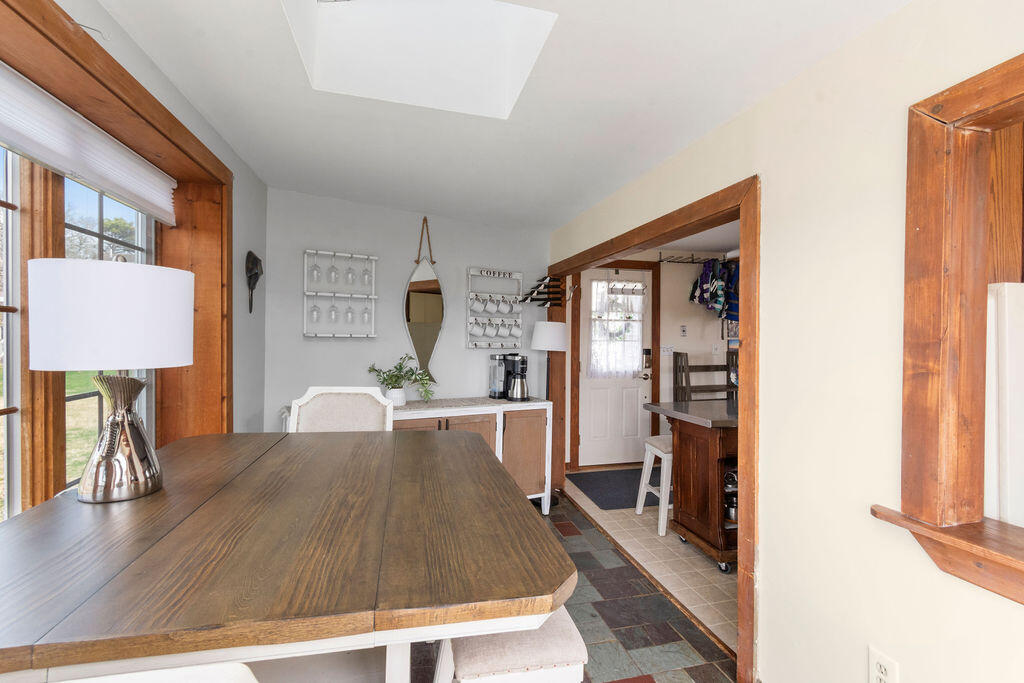 14 Lower County Road Dennis Port, MA 02639 - Photo 16 of 56 a view of a living room and dining room