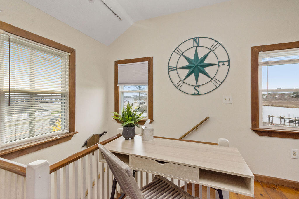 14 Lower County Road Dennis Port, MA 02639 - Photo 37 of 56 a view of a livingroom with furniture and window