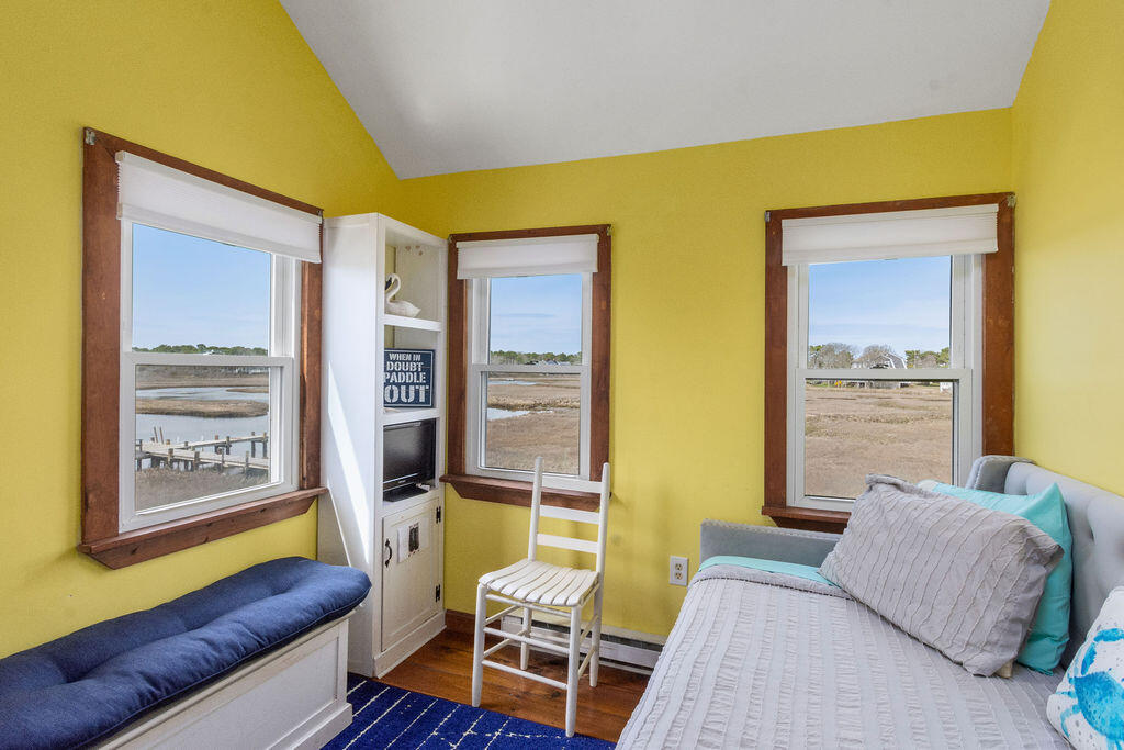 14 Lower County Road Dennis Port, MA 02639 - Photo 40 of 56 a living room with furniture and a window
