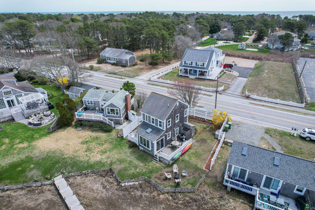 14 Lower County Road Dennis Port, MA 02639 - Photo 53 of 56 an aerial view of a house with outdoor space