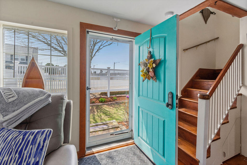 14 Lower County Road Dennis Port, MA 02639 - Photo 6 of 56 a view of living room furniture and a window